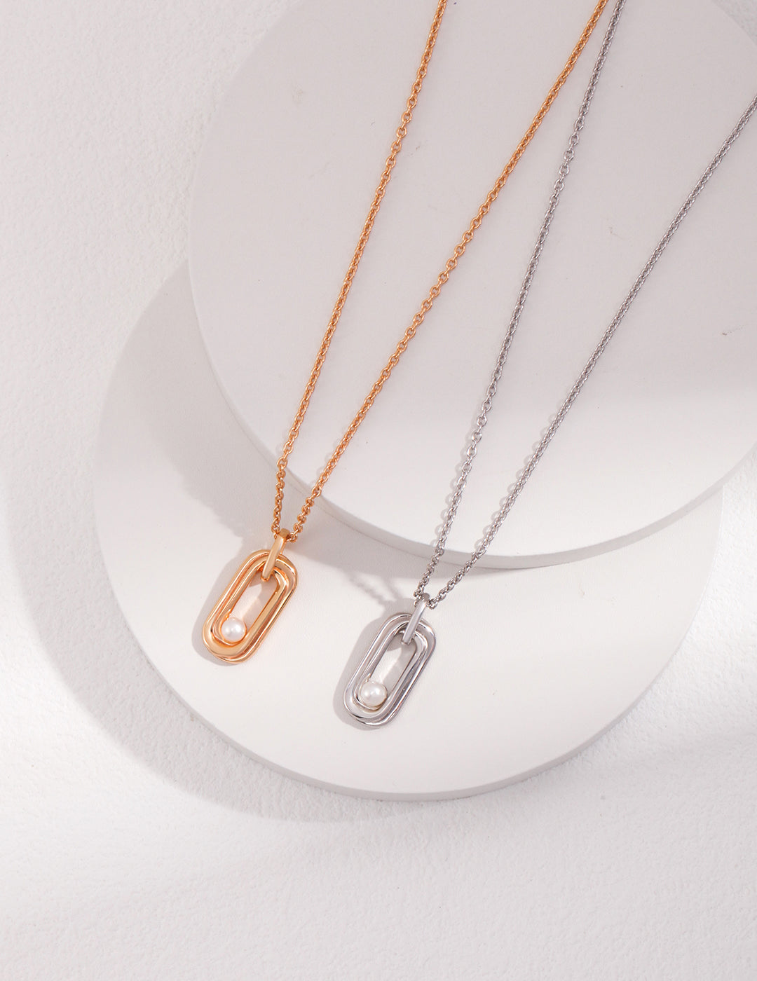 Sterling Silver Pearl Necklace with Twisted Möbius Oval Design